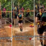Mãe viraliza ao atravessar ponte com filha durante corrida